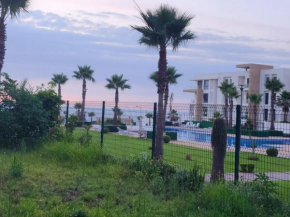Plage dès nations 2 bedroom apartment with backyard view